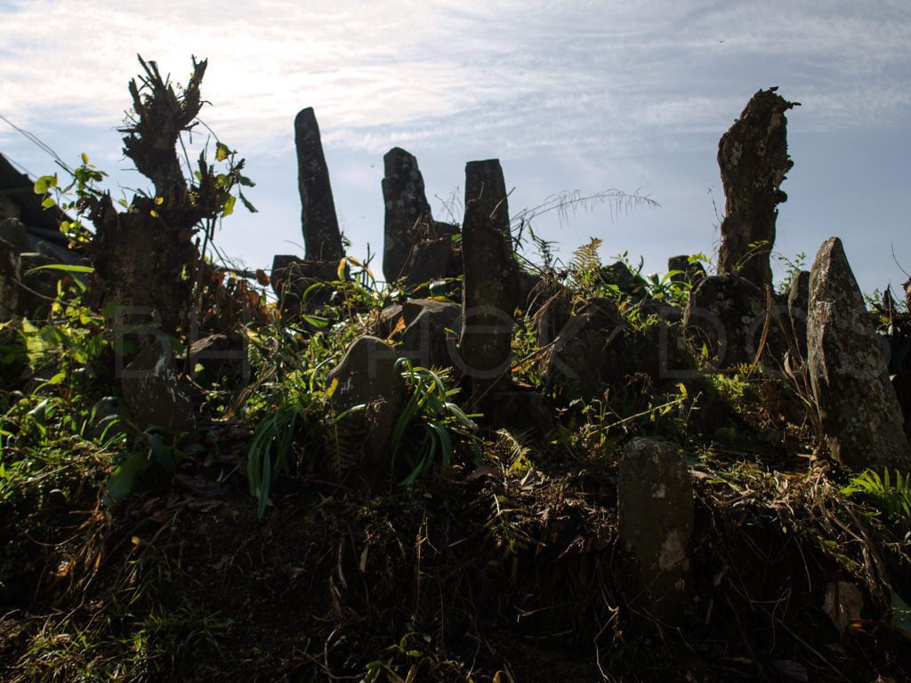 Travelling to Headhunter Basti Mon the ritual stone where heads of enemies are buried