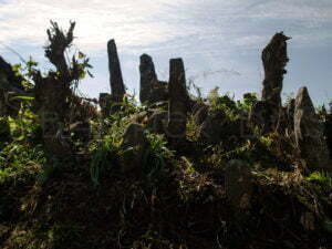 The piles of stones in the village show the number of heads they have hunted
