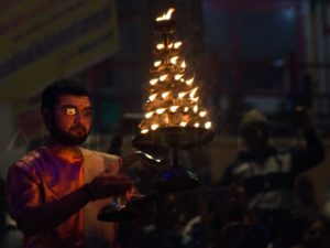 A performance of devotion with the light-up of flaring lamps