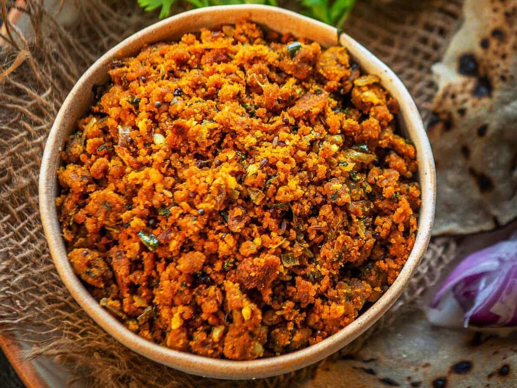 Zunka or Jhunka is a popular traditional staple dish of rural Maharashtra. This Maharashtrian delicacy is a spicy preparation