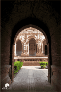 Marvel of curved Bangla roof blended along the domes