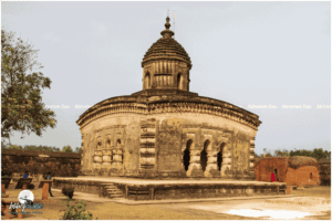 A square-raised plinth with descriptive decorated arches has a Char-Chala roof