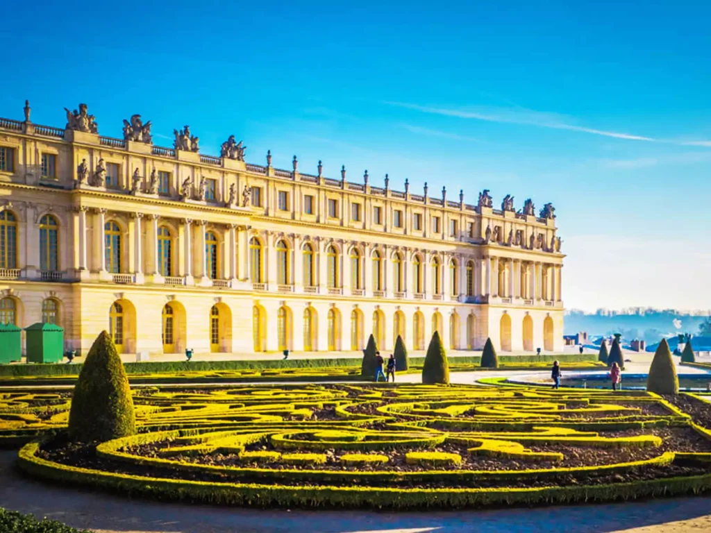 French royalty by visiting the Palace of Versailles
