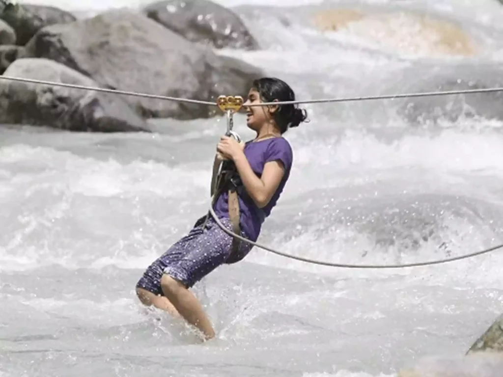 River Crossing is an extremely thrilling activity that requires a person to cross a river using ropes In Solang Valley